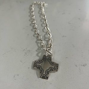 A Silpada classic cross necklace.
